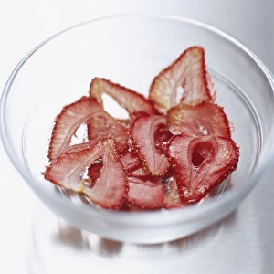 Bowl of strawberry crisps, close up