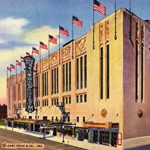Chicago Stadium. ca. 1941, Chicago, Illinois, USA, 127--The Chicago Stadium, Madison, Wood, Warren and Wolcott Streets, Chicago. The largest indoor sports arena in the world with seating capacity for 25, 000 persons. A feature of the huge auditorium is a giant organ. The greatest ever built, with a volume of a military band of 2, 500 pieces