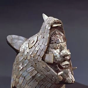 Figure depicting coyote with warriors head in its jaws, mother of pearl mosaic, from Tula