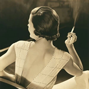 A Glamourous Woman Smoking