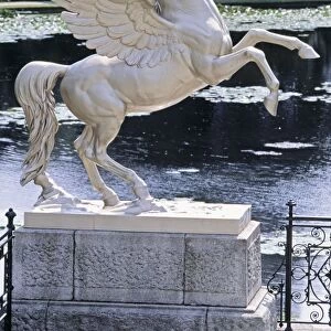 Ireland, County Wicklow, near Enniskerry, Powerscourt, Pegasus statue by a pond, close-up