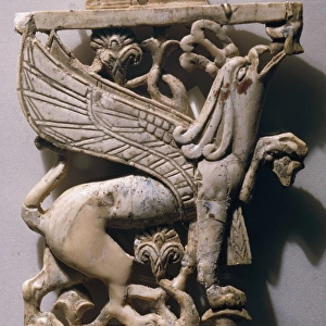 Ivory plate carving of winged griffin, from Nimrud