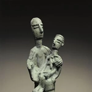 Nuragic civilization. Mother of the Fallen small bronze statue, from Sardinia Region, Italy