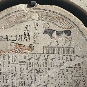 Painted limestone stele of god Apis, detail with the deceased in adoration before the Apis bull
