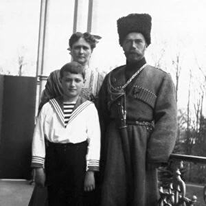 The royal couple of russia, tsar nicholas ll and tsarina alexandra fyodorovna with their son
