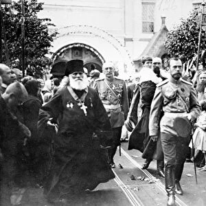 Ruassian emperor nicholas ll and his heir alexei (boy being carried) leaving novospassky monastery, may 26, 1913