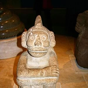 Seated sandstone figure of Mictlantecuhtli: Aztec, AD 1325-1521. Mexico. Mictlantecuhtli