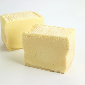 Sliced brick of Belgian Herve cows milk cheese