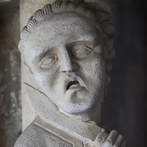 Detail of a statue in Saint Georges abbey chapter house (12th century)
