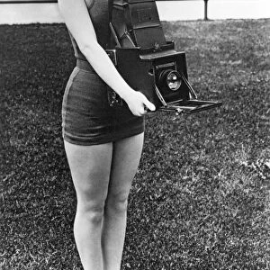 A Woman And Her Camera