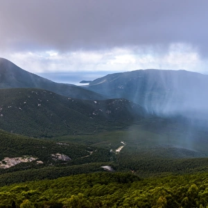 Rain cloud passing by at the top of Mount Oberon at Wilsons Promontory, Victoria