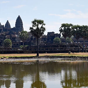 Angkor wat towers over pond - Siem Reap, Cambodia