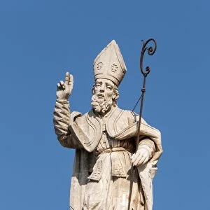 Baroque statue on top of the column of Saint Oronzo, Ostuni, Apulia, Italy