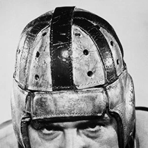 FOOTBALL PLAYER IN LEATHER HELMET, 1920s