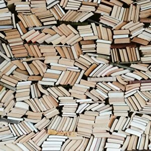 Hundreds of books in chaotic order