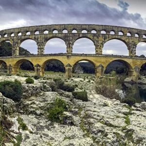 Panoramic view of the Pont du Gard in march at dusk, southern France