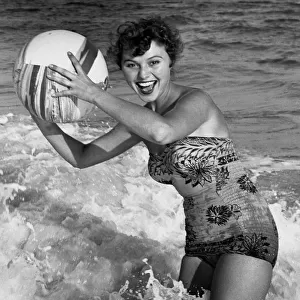 Woman in water w / beachball