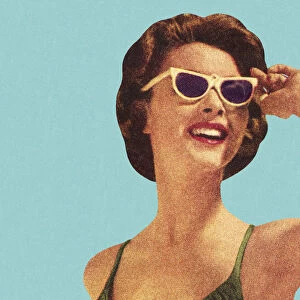Woman Wearing Sunglasses and Green Swimsuit