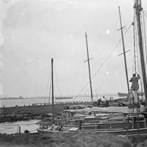 Erith yacht club. Sailors climb the rigging. 1936