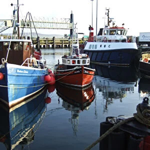 Fishing boats in harbour, Stromness, Orkney, UK credit: Marie-Louise Avery / thePictureKitchen