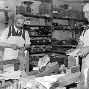 Making of wooden shoe lasts ( W. H. Smith, Sloane Street ). Smoothing after shaping the last
