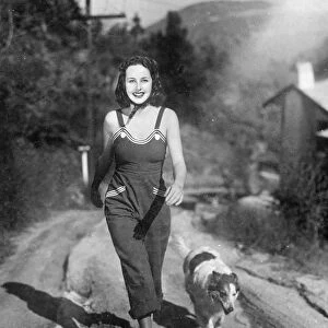 Overalls as film actress walking costume. Barbara Read, the film actress, prefers