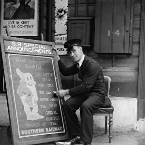 Railway porter sign writer Mr E A Burgar. 1938