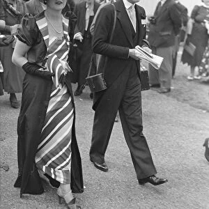 Rainbow fashion at Ascot. Photo shows: Mrs W. J. Connell wearing dazzling rainbow