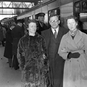 At Waterloo, on leaving for America. Mr Herbert Morrison with his wife and daughter, Mary