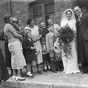 The wedding of Mr W Maitland and Miss R E Clark in Gravesend, Kent. The bride and groom