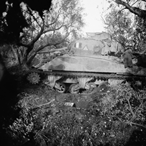 2Tp tank blown on minefield, c. 1944 (b / w photo)