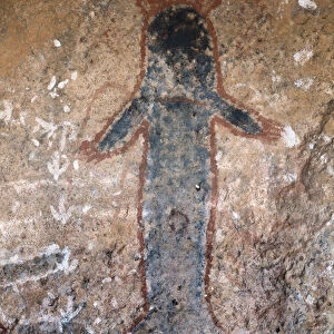Aboriginal rock painting, figure of woman (tiliqua?), in Uluru (or Ayers Rock)
