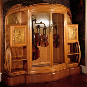 Art Nouveau: Mahogany musical instrument cabinet made by Alexandre Charpentier (1856-1909