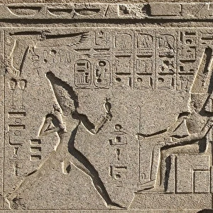 Egyptian antiquite: detail of the architrave decorates the representation of Pharaoh