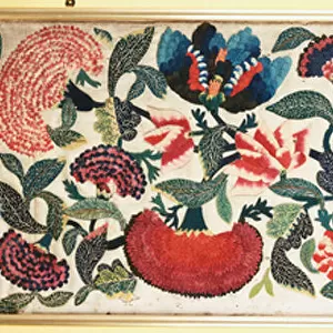 A felt and applique panel with embroidered silk highlights depicting carnations