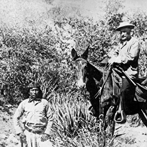 General George Crook on a mule, with two Apache in Arizona, 1882 (b / w photo)