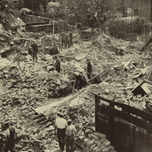 Houses destroyed by a German air raid on Cambridge, World war II, June 1940 (b / w photo)