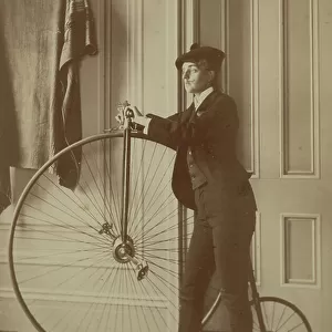 Inside the house with a Penny Farthing Bicycle, c. 1890 (sepia photo)
