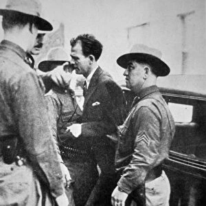 Jack Legs Diamond (1896-1931) being taken into police custody, 1918 (b / w photo)