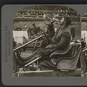 Louis Chevrolet drinks a Coca-Cola during the Atlanta National Automobile Exposition, Georgia, 1909 (stereograph)