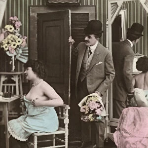 Man bringing a bouquet to a dressing woman (colour photo)