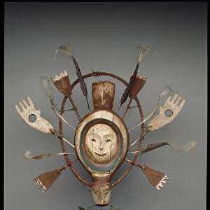 Mask with seal or sea otter spirit, late 19th century (wood, paint, gut cord & feathers)