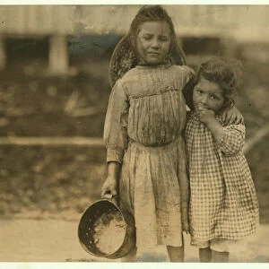 Maud and Grade Daly, 5 and 3 years old pick about a pot of shrimp each day for the