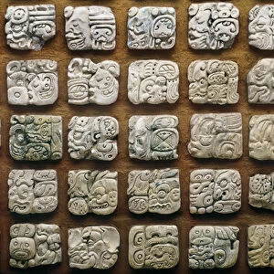 Maya calendar (320-1697) composed of different glyphs (engraved stones)