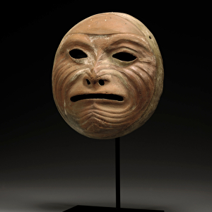 A Middle Mochica mask of an aged dignitary, c. 100-200