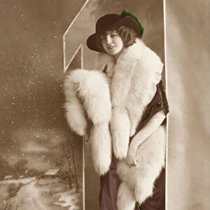 New Years greetings card with a portrait of a young woman dressed in furs (photo)