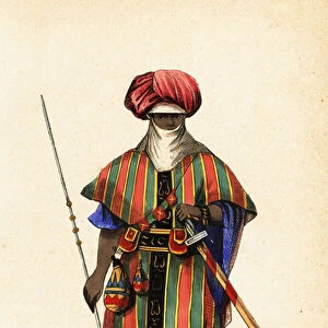 Noble Tuareg warrior of Agadez, Niger, in tagelmust (turban and veil), taktkat (shirt) and akarbey (pants)