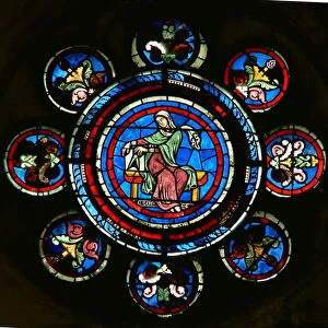 Detail from the north rose window depicting Geometry from the Liberal Arts (stained glass