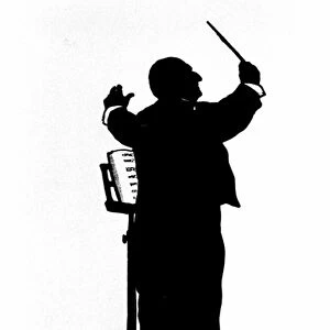 Performance of the Austrian composer Anton Bruckner (1824 - 1896), conducting an orchestra. Chinese shadow of O. Bohler