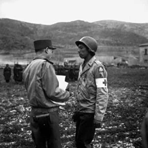 Private Jonathan Hoag is awarded the Croix de Guerre by French General Alphonse Juin, Italy, 21st March, 1944